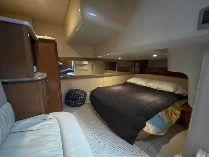  Yacht Photos Pics 2008 Meridian 411 yacht interior with cozy bedroom and modern furnishings.