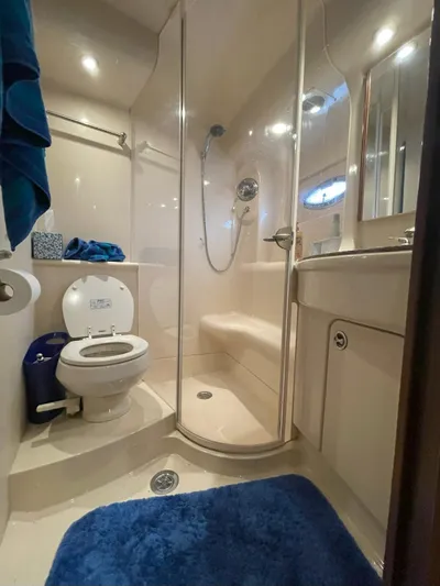  Yacht Photos Pics Luxurious bathroom in 2008 Meridian 411 yacht with shower and toilet.