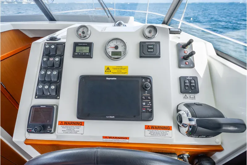  Yacht Photos Pics Control panel of a 2017 Beneteau Swift Trawler 30 with navigation equipment.