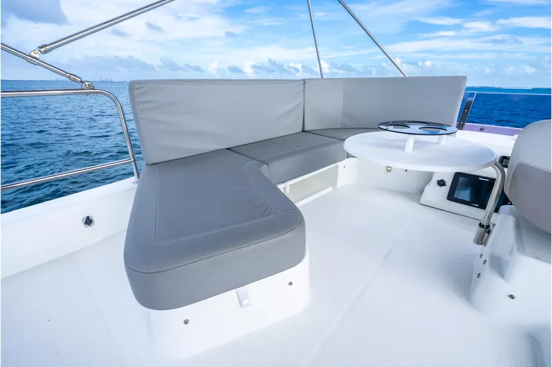  Yacht Photos Pics 2017 Beneteau Swift Trawler 30 deck with gray seating and ocean view.