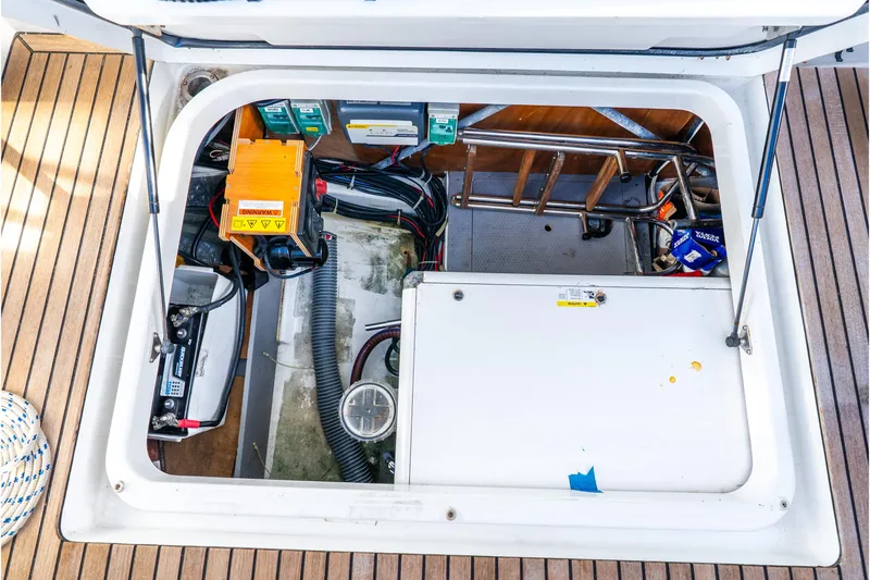  Yacht Photos Pics Engine compartment of 2017 Beneteau Swift Trawler 30 with visible equipment and wiring.