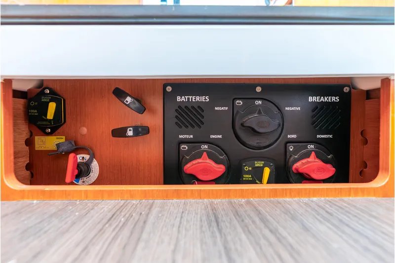  Yacht Photos Pics Electrical panel of 2017 Beneteau Swift Trawler 30, featuring battery and breaker controls.