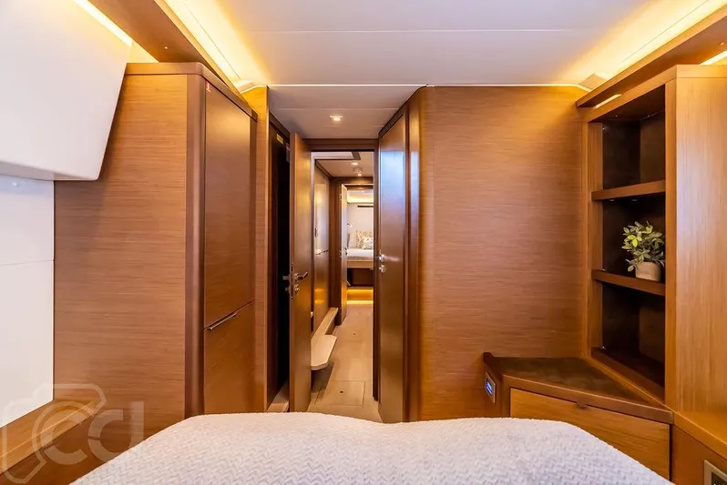 Flying B Yacht Photos Pics Luxurious interior of 2021 Lagoon 46 yacht with wood finish and modern design.