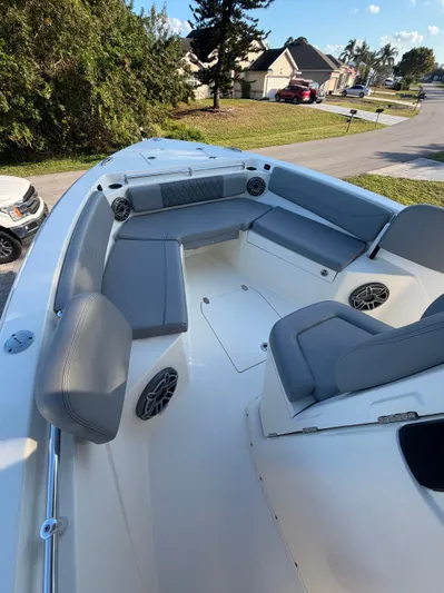  Yacht Photos Pics 2024 Cobia 240 Center Console with gray seating and speakers.