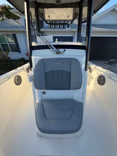  Yacht Photos Pics 2024 Cobia 240 Center Console boat with gray seating.