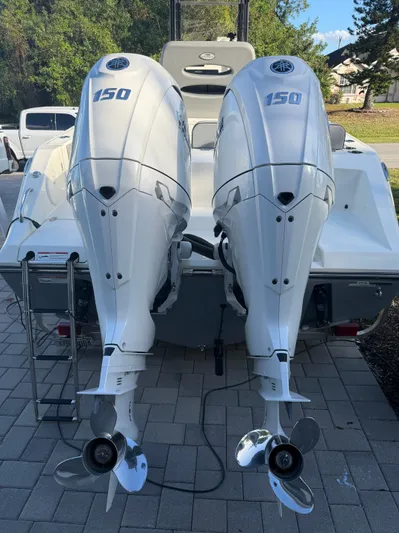  Yacht Photos Pics Two outboard motors on a 2024 Cobia 240 Center Console boat.