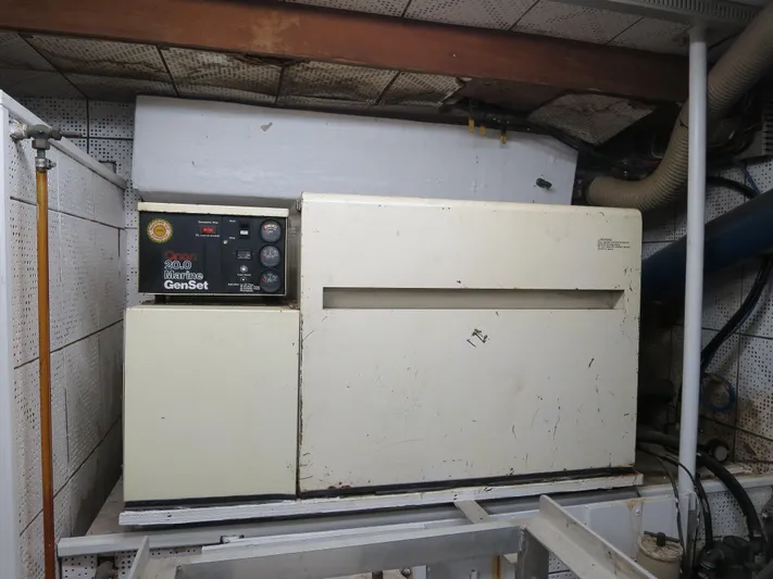 Water Doctor Yacht Photos Pics 1988 DeFever 53POC engine room with Onan Marine GenSet generator.