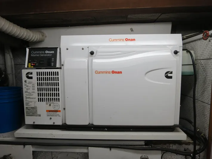 Water Doctor Yacht Photos Pics Cummins Onan marine generator in a 1988 DeFever 53POC yacht engine room.