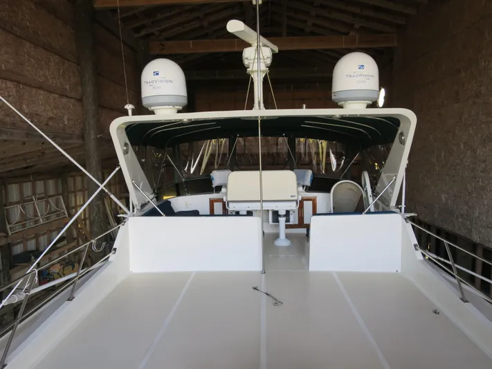 Water Doctor Yacht Photos Pics 1988 DeFever 53POC yacht in storage, featuring spacious deck and navigation equipment.