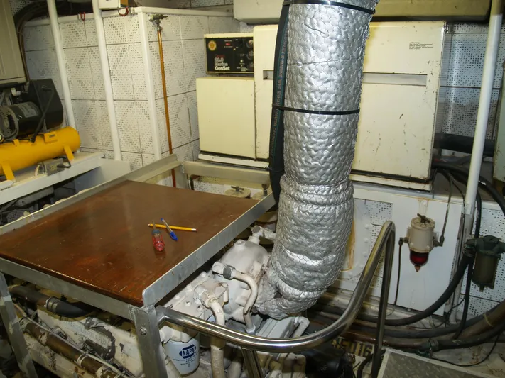 Water Doctor Yacht Photos Pics Engine room of 1988 DeFever 53POC yacht with tools and equipment.