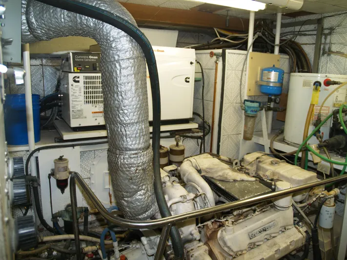 Water Doctor Yacht Photos Pics Engine room of 1988 DeFever 53POC yacht with machinery and equipment.