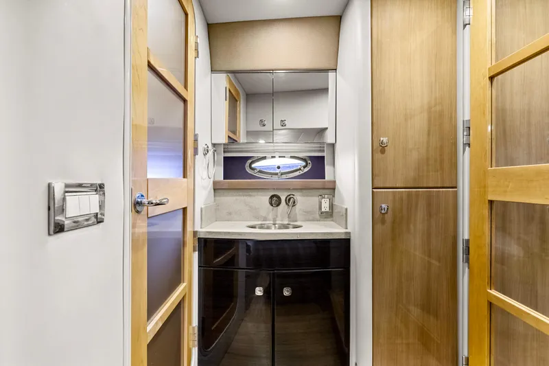 Black Diamond Yacht Photos Pics Luxurious bathroom interior of 2016 Formula 45 Yacht with modern fixtures and wooden accents.