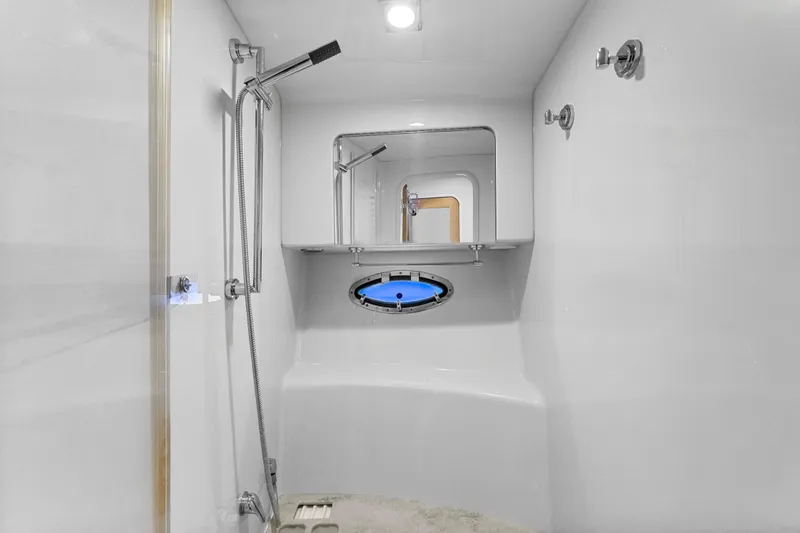 Black Diamond Yacht Photos Pics Modern shower area in 2016 Formula 45 Yacht with sleek fixtures and porthole window.