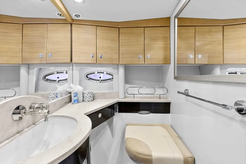 Black Diamond Yacht Photos Pics Luxurious bathroom interior of 2016 Formula 45 Yacht with modern fixtures and wooden cabinetry.