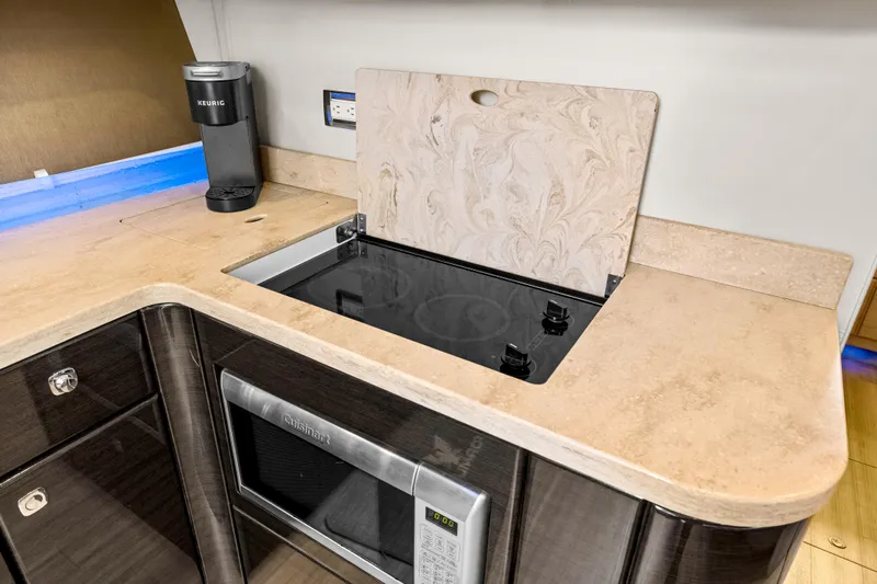 Black Diamond Yacht Photos Pics Modern yacht kitchen with stove, microwave, and coffee maker on a Formula 45 Yacht, 2016 model.