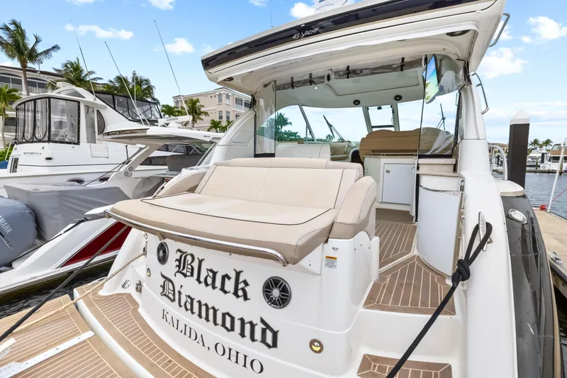 Black Diamond Yacht Photos Pics 2016 Formula 45 Yacht "Black Diamond" docked, featuring spacious seating and elegant design.