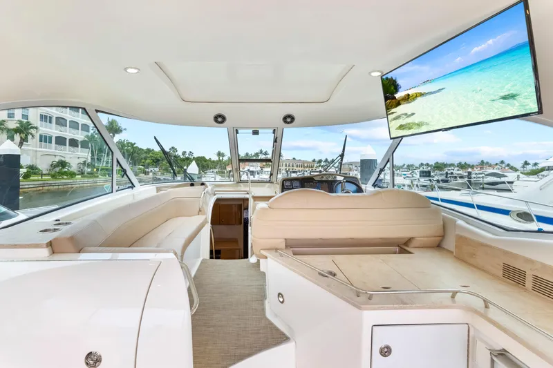 Black Diamond Yacht Photos Pics Interior of 2016 Formula 45 Yacht with luxurious seating and scenic view.