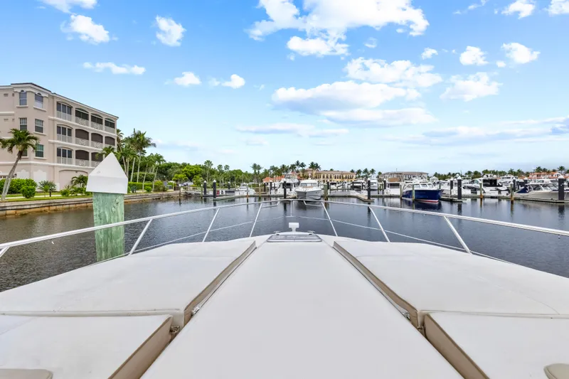 Black Diamond Yacht Photos Pics 2016 Formula 45 Yacht docked in a scenic marina with clear skies.