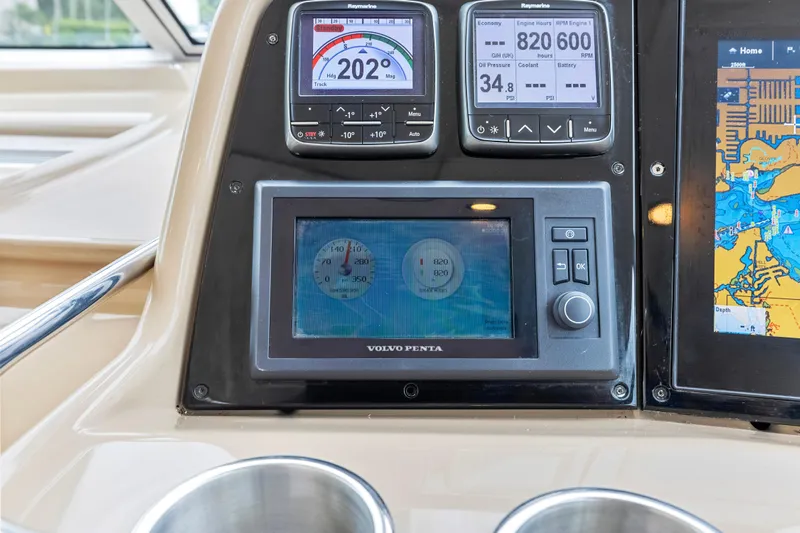 Black Diamond Yacht Photos Pics Control panel of a 2016 Formula 45 Yacht with navigation and engine displays.