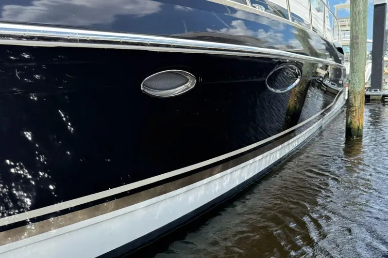 Black Diamond Yacht Photos Pics 2016 Formula 45 Yacht docked, showcasing sleek black hull and chrome accents.