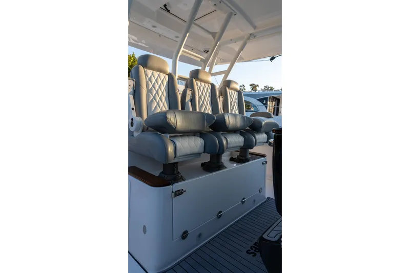 Almost Heaven Yacht Photos Pics 2024 Everglades 395 Center Console boat seats with diamond-stitched upholstery.