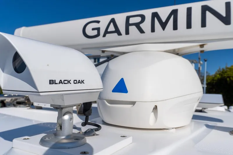 Almost Heaven Yacht Photos Pics 2024 Everglades 395 Center Console with Garmin and Black Oak equipment.