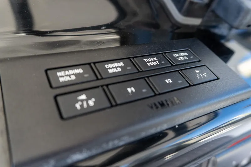 Almost Heaven Yacht Photos Pics Control panel of 2024 Everglades 395 Center Console with navigation buttons.