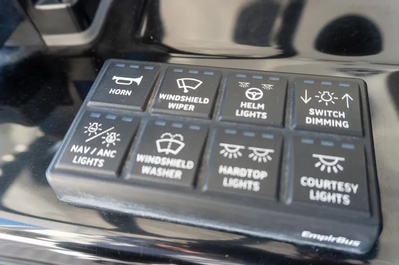 Almost Heaven Yacht Photos Pics Control panel of 2024 Everglades 395 Center Console with various light and function switches.