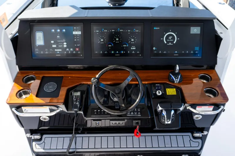 Almost Heaven Yacht Photos Pics 2024 Everglades 395 Center Console dashboard with advanced navigation displays and controls.