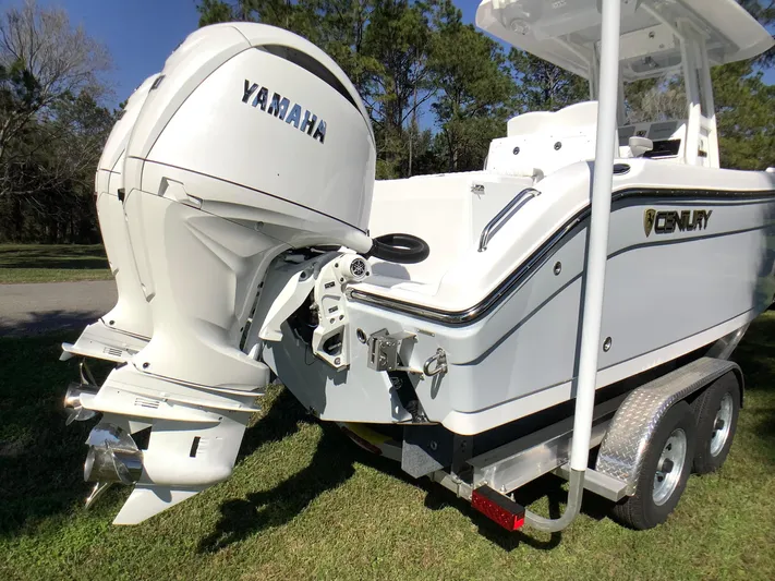 Highly Upgraded - 2025 Century 2600 Cc Yacht Photos Pics 2025 Century 2600 Center Console boat with Yamaha outboard engine on trailer.
