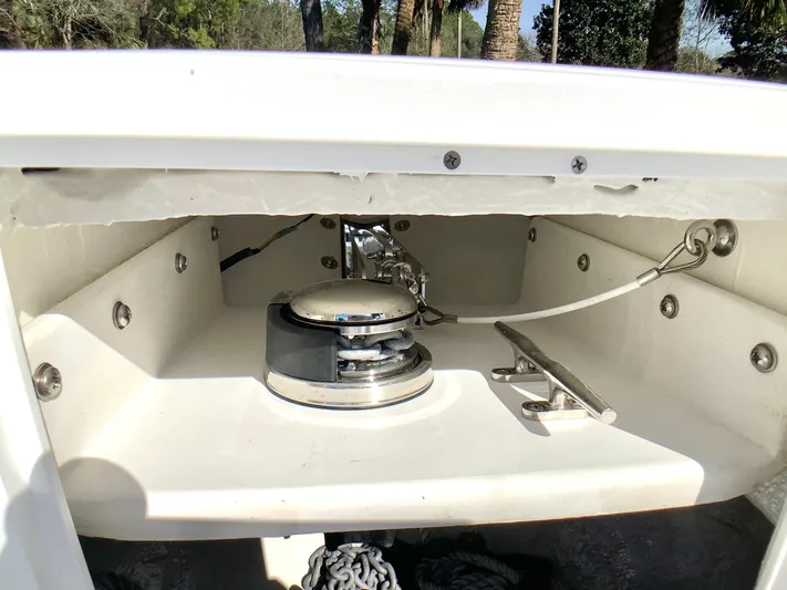 Highly Upgraded - 2025 Century 2600 Cc Yacht Photos Pics 2025 Century 2600 Center Console boat anchor compartment with winch and chain.