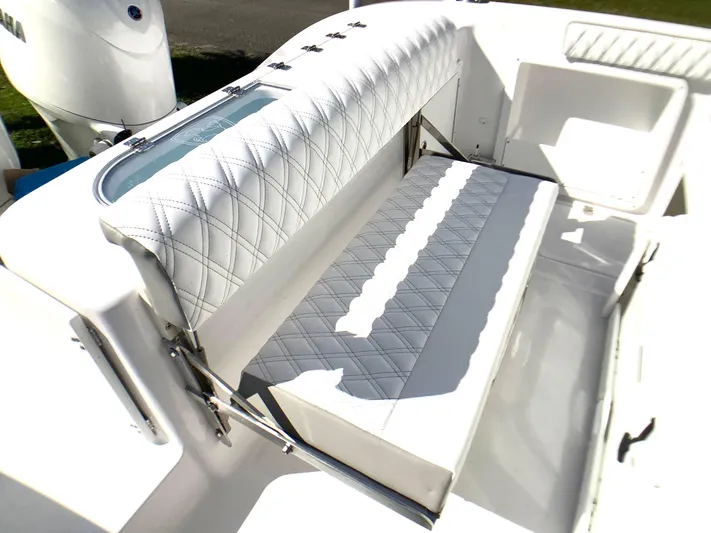 Highly Upgraded - 2025 Century 2600 Cc Yacht Photos Pics 2025 Century 2600 Center Console boat with white quilted seating.