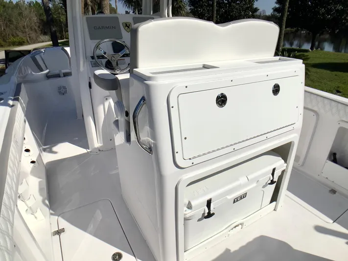 Highly Upgraded - 2025 Century 2600 Cc Yacht Photos Pics 2025 Century 2600 Center Console boat interior with storage and steering console.