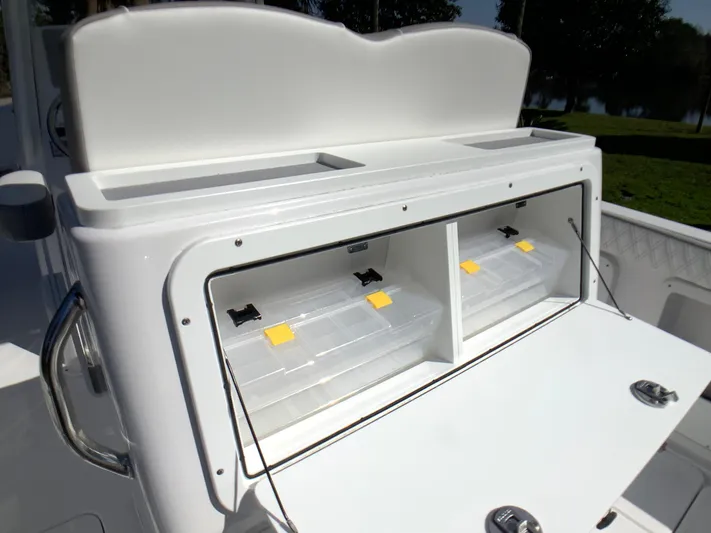 Highly Upgraded - 2025 Century 2600 Cc Yacht Photos Pics 2025 Century 2600 Center Console boat storage compartments with open hatch, showcasing organized interior.