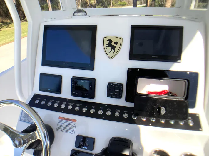Highly Upgraded - 2025 Century 2600 Cc Yacht Photos Pics 2025 Century 2600 Center Console dashboard with dual screens and control panel.
