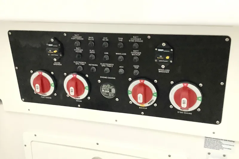 Highly Upgraded - 2025 Century 2600 Cc Yacht Photos Pics Control panel of 2025 Century 2600 Center Console boat with switches and dials.