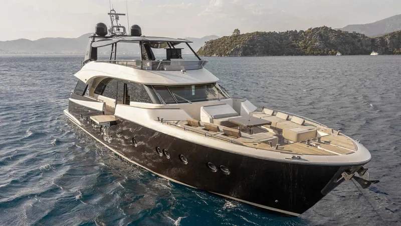  Yacht Photos Pics Luxury Monte Carlo Yachts MCY 86, 2016 model, cruising on serene waters.