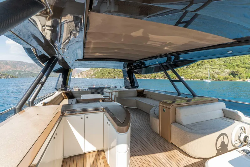  Yacht Photos Pics Luxurious 2016 Monte Carlo Yachts MCY 86 interior with elegant seating and scenic ocean view.