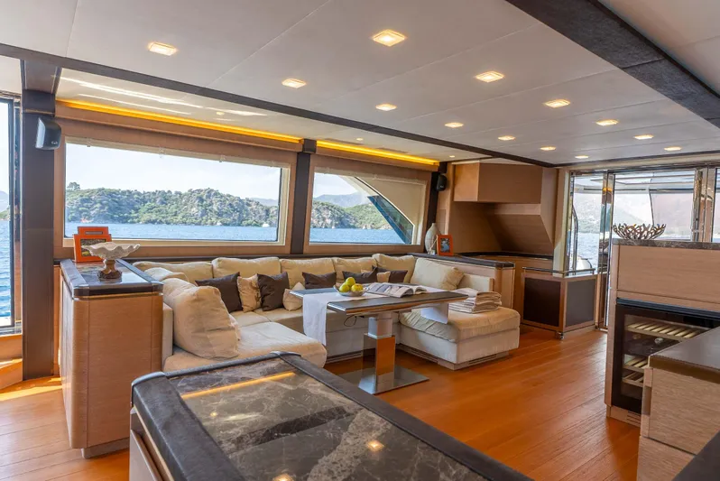  Yacht Photos Pics Luxurious interior of 2016 Monte Carlo Yachts MCY 86 with scenic ocean view.