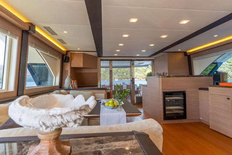  Yacht Photos Pics Luxurious interior of 2016 Monte Carlo Yachts MCY 86 with elegant furnishings and modern design.