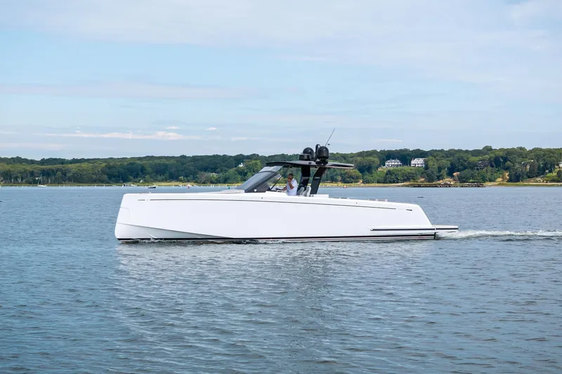 Lady Di Yacht Photos Pics 2024 Pardo Yachts 43 cruising on calm waters with scenic shoreline backdrop.