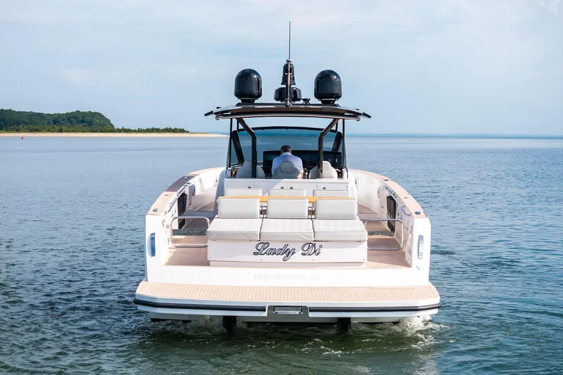 Lady Di Yacht Photos Pics 2024 Pardo Yachts 43 cruising on calm waters, rear view.