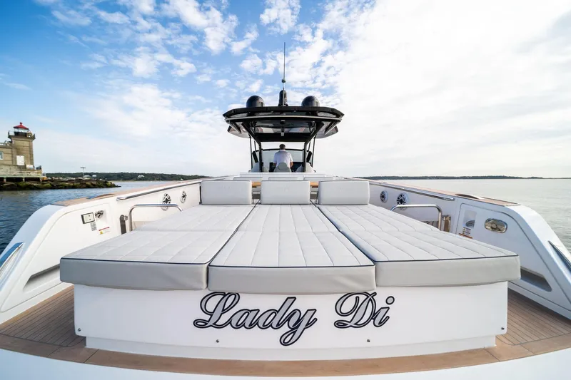 Lady Di Yacht Photos Pics 2024 Pardo Yachts 43, luxury deck view with sunbeds, named "Lady Di" on calm waters.