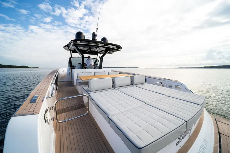 Lady Di Yacht Photos Pics 2024 Pardo Yachts 43 on calm waters, featuring spacious deck and luxurious seating.