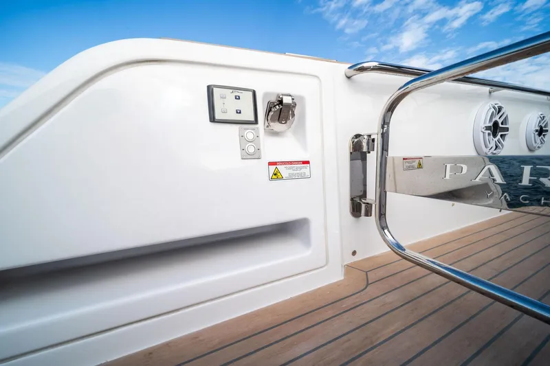 Lady Di Yacht Photos Pics 2024 Pardo Yachts 43 deck detail with control panel and speakers, under a clear blue sky.