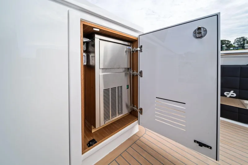 Lady Di Yacht Photos Pics Open storage compartment on 2024 Pardo Yachts 43, showcasing interior design and functionality.
