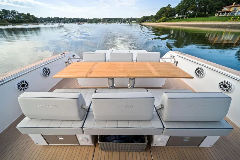 Lady Di Yacht Photos Pics 2024 Pardo Yachts 43 luxury yacht deck with seating and wooden table.