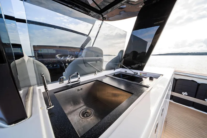 Lady Di Yacht Photos Pics Modern kitchen area on 2024 Pardo Yachts 43, featuring sleek sink and stove.