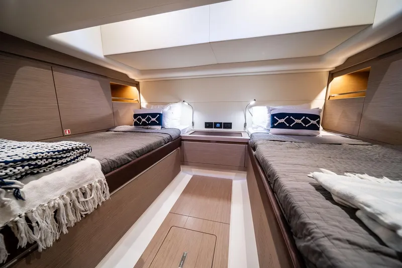 Lady Di Yacht Photos Pics Luxurious 2024 Pardo Yachts 43 cabin interior with twin beds and modern design.