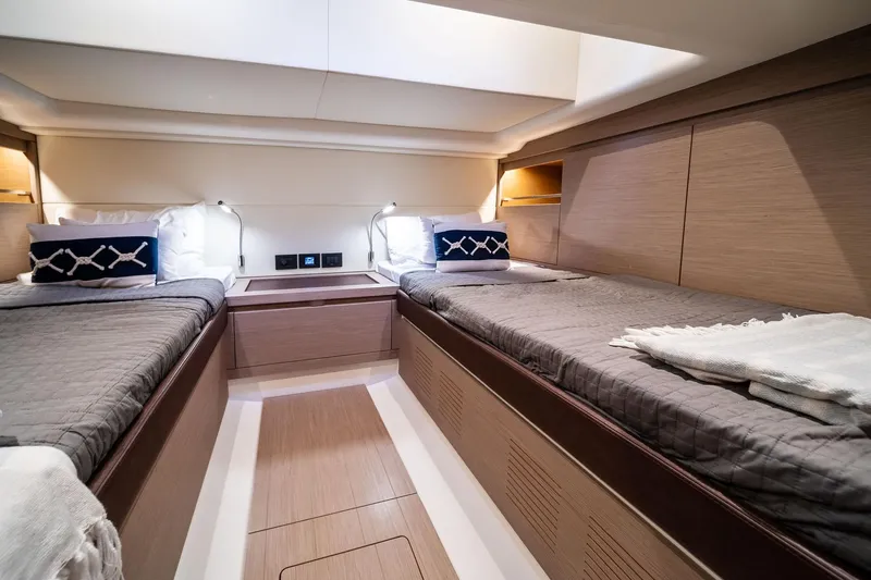 Lady Di Yacht Photos Pics Luxurious 2024 Pardo Yachts 43 cabin interior with twin beds and modern design.